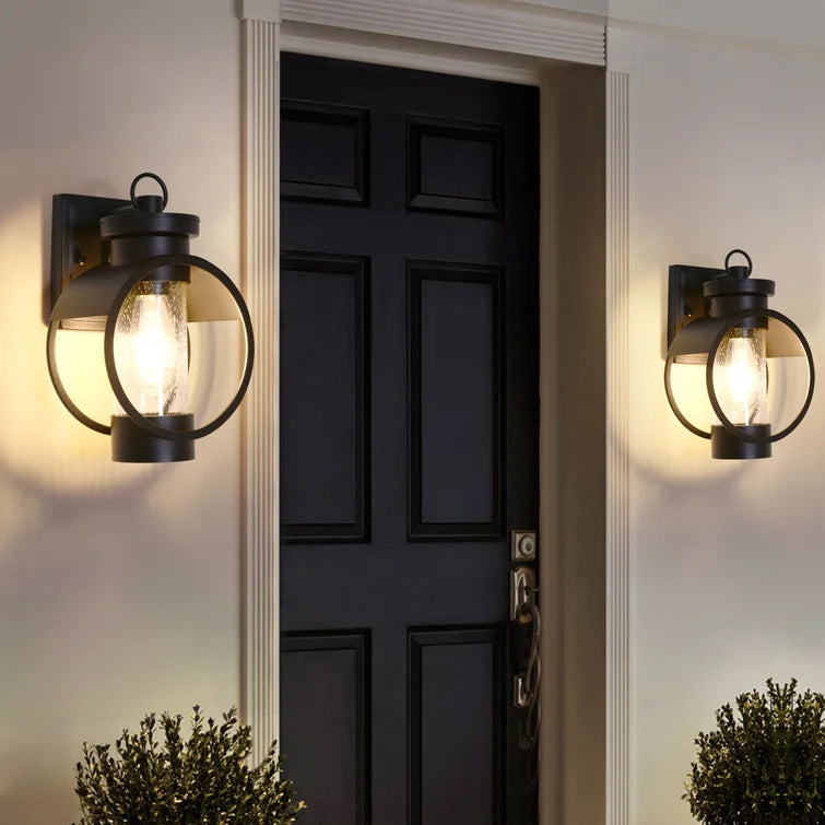 Joelle Black 1 - Bulb 11.8'' H Glass Outdoor Wall Lantern with Dusk to Dawn (Set of 2)